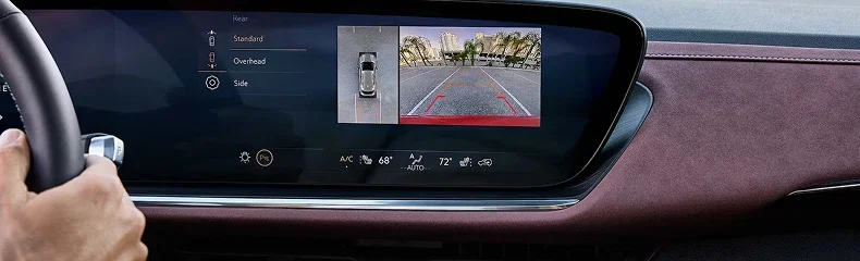 Buick touchscreen showing the overhead and rear camera views while reversing